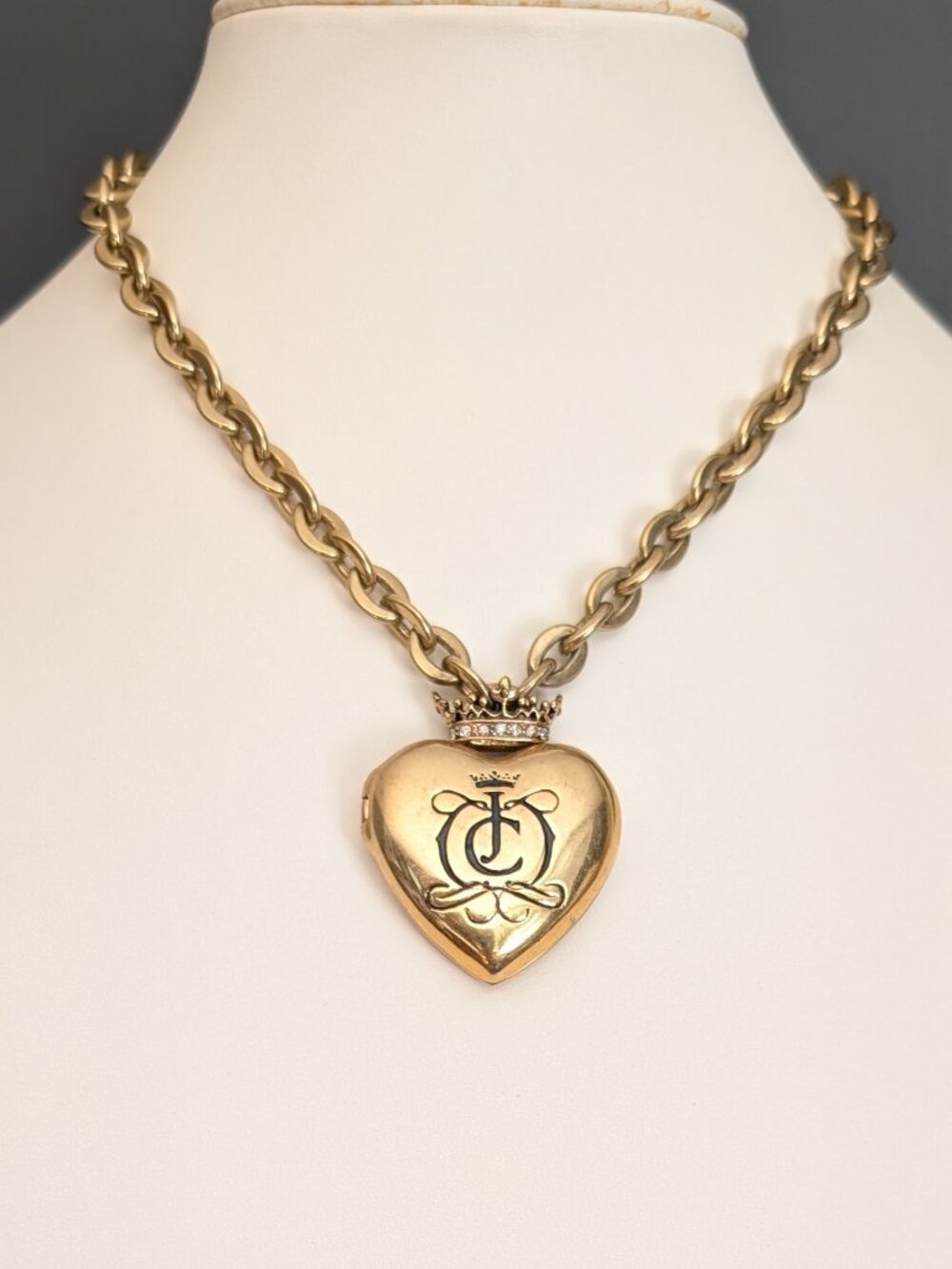 Oversized Juicy Couture gold tone locket necklace